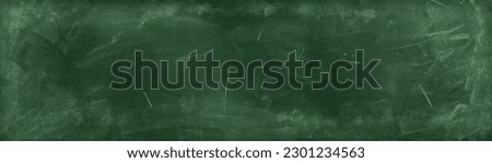 Chalk rubbed out on green chalkboard background Royalty-Free Stock Photo #2301234563