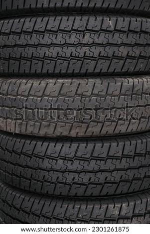 Clean dark black tire texture background. Use for web, landing page background, flyer, brochure, print.