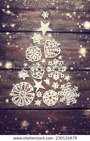 Christmas tree framed from snowflakes