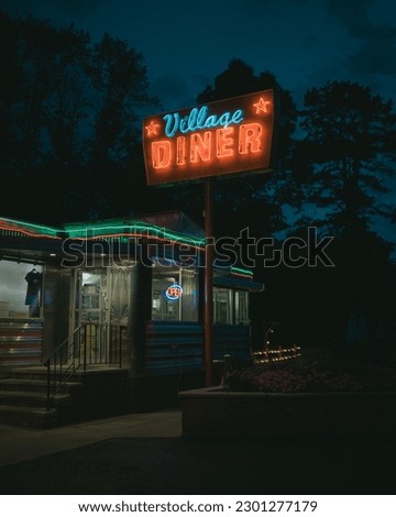 Village Diner vintage neon sign at night, Milford, Pennsylvania Royalty-Free Stock Photo #2301277179