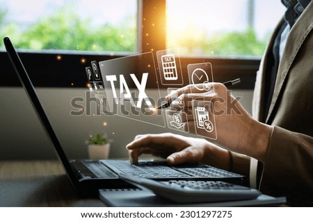 Tax payment and tax deduction planning involve strategies to minimize tax liability. This includes maximizing deductions and credits, deferring income, and accelerating deductions. tax professional Royalty-Free Stock Photo #2301297275