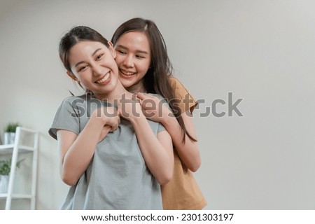 Happy asian girl couple cheerful. Homosexual couple hugging each other in love. LGBT Lesbian couple love. Royalty-Free Stock Photo #2301303197