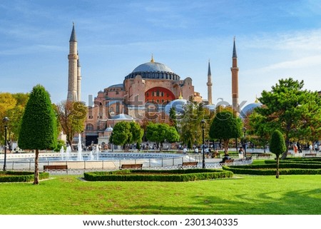 Fountain at Sultanahmet Square and the Hagia Sophia in Istanbul, Turkey. The Sultanahmet Square is a popular tourist attraction of Istanbul. Royalty-Free Stock Photo #2301340335
