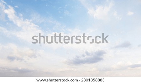 A beautiful scenic view of the sky with clouds, showcasing the natural beauty and peacefulness of the landscape Royalty-Free Stock Photo #2301358883