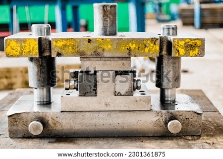 An element of a lathe for fixing a metal part for processing. Industrial processing of metal products with a cutting tool on an automatic lathe
