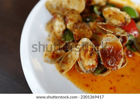Fragrant stir fry silky clam with spicy sauce