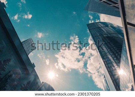 The towers of the business center on the background of the sky with clouds. The concept of a Business center.