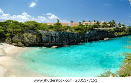 Playa Lagun Beach Curacao, Lagun Beach Curacao a small island in the Caribbean. white tropical beach on the Caribbean island of Curacao  Royalty-Free Stock Photo #2301379151