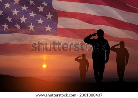 Silhouettes of soldiers saluting on background of sunset or sunrise and USA flag. Greeting card for Veterans Day, Memorial Day, Independence Day. America celebration. Royalty-Free Stock Photo #2301380437