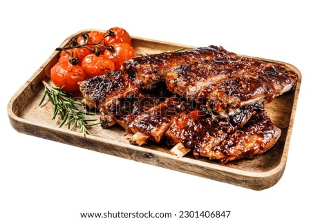 Roasted sliced barbecue pork ribs. Grilled meat. Isolated on white background Royalty-Free Stock Photo #2301406847