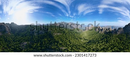 360 Aerial Panorama of Aiguilles de Bavella: Majestic Peaks, Misty Valleys, and Endless Forests in Corsica's Enchanting Landscape