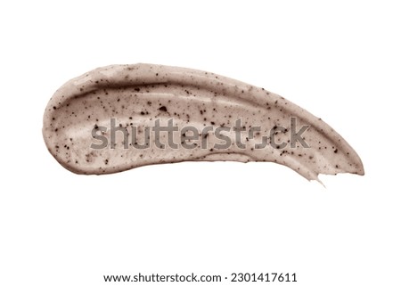 Face cream coffee scrub swatch isolated on white background. Cosmetic exfoliation product. Handmade coffee scrub for body care. Royalty-Free Stock Photo #2301417611