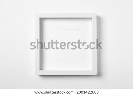 Empty frame on white background. Mockup for design