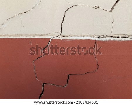 Crack cement background. Two tone wall. Royalty-Free Stock Photo #2301434681