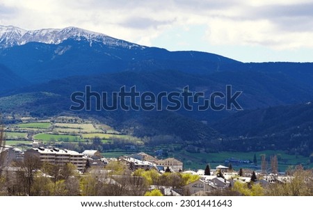 Mountain landscape with village and mountains in the background in the region of Alt Urgell, Lleida. 