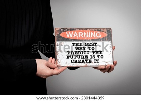 The Best Way to Predict the Future is to Create It. Warning sign.