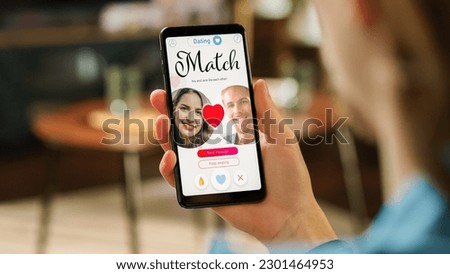 POV Dating App Concept: Person Uses Smartphone for Browsing Social Media Dating Application. Person Swiping, Searching, Screen Shows Matching with Partner, Finding True Love Royalty-Free Stock Photo #2301464953