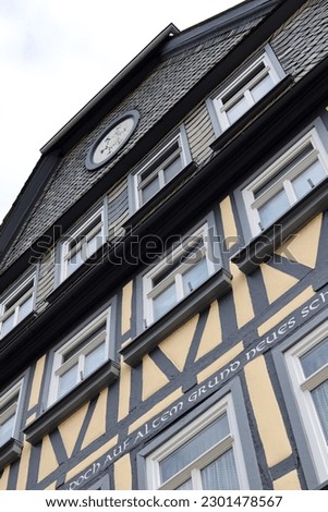 facade of an old half-timbered house.