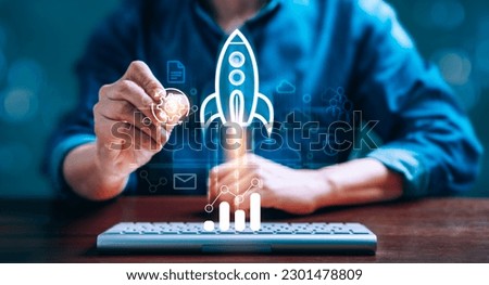 Businessman launching a transparent rocket icon, concept of startup business taking off and achieving success, represents the network connection, digital technology and connectivity in business world