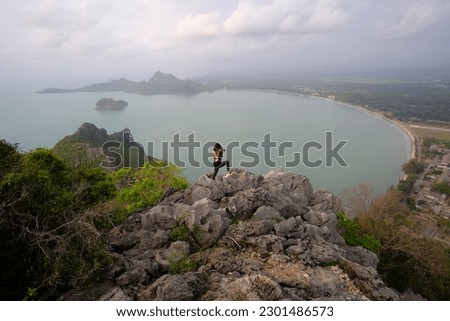 Mueang District, Prachuap Khiri Khan Province, Thailand. Ao Manao is located in Wing 5 Royal Thai Air Force, Ko Lak Subdistrict,  It is a clean beach with beautiful nature.
