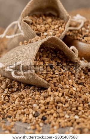 natural ecological grown buckwheat, lots of buckwheat close-up Royalty-Free Stock Photo #2301487583