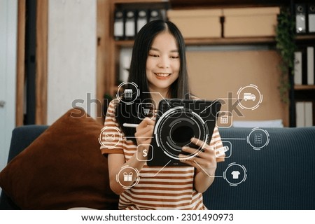  Asian Woman Hand using tablet ,laptop, and holding smartphone with credit card online banking payment communication network, internet wireless application virtual icon 