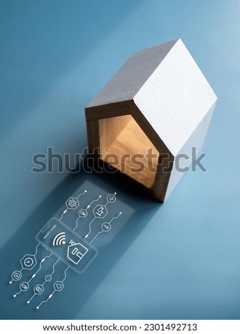 Smart home technology concept. Virtual circuit futuristic interface smart home digital control, automation assistant near white minimal house model on blue background, vertical style.
