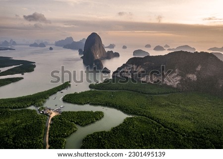 Sunrise view of the Phang Nga bay viewpoint taken at Samet Nangshe Viewpoint near Phuket in Southern Thailand. Southeast Asia travel, trip and summer vacation drone photography. Royalty-Free Stock Photo #2301495139
