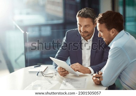 Tablet work, happy and business people in meeting for planning, collaboration and strategy. Smile, speaking and corporate men reading information on technology for a plan, ideas or teamwork in office Royalty-Free Stock Photo #2301505057