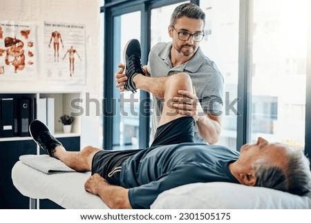 Stretching legs, rehabilitation and a physiotherapist with a man for wellness and disability support. Help, health and a male doctor helping an elderly person with physiotherapy on body muscle Royalty-Free Stock Photo #2301505175