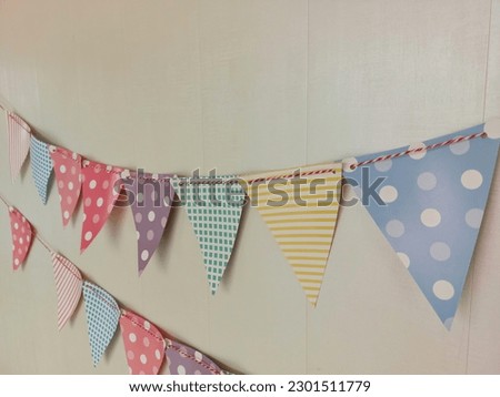An image of a flag at a party can be used as a background.  can be used to decorate text
