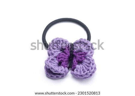 Crochet hair clips in the shape of a violet flower