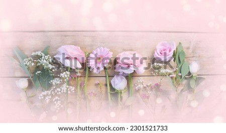Beautiful bouquet of flowers on rustic wooden board - floral background banner with spring flowers - mothers day, wedding, birthday greeting card
