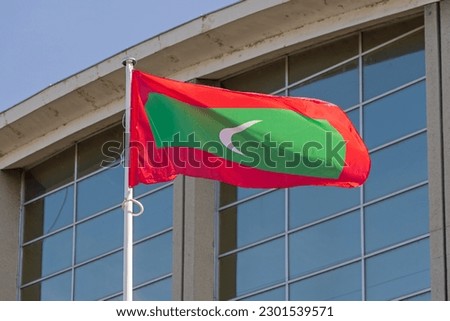 Flag of Republic of Maldives in Front of Building