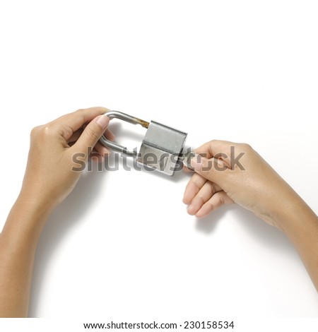 two woman hands open padlock with key on a white background