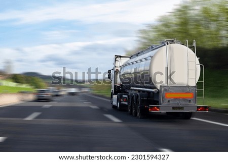 Tanker travels along the highway at speed