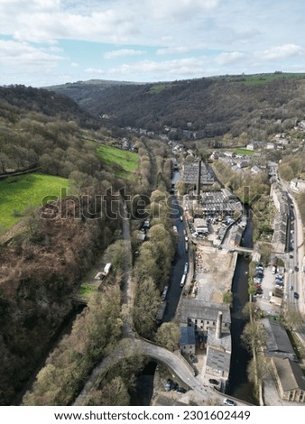 Aerial view of Hebden Bridge with views of the town and traditional stone buildings. 