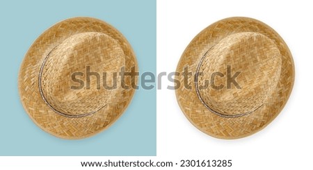 Gardening wicker straw hat, top view isolated on white and light blue background, spring concept for home gardening or vegetable garden and plant care.