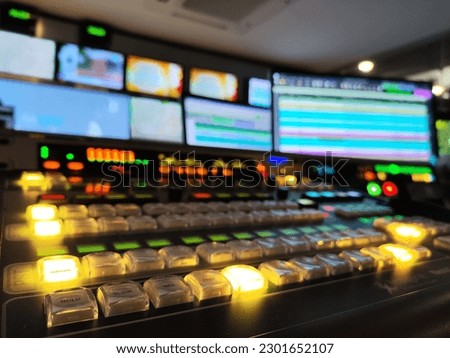 Blur images of multiple Television Broadcast. in Master control room.