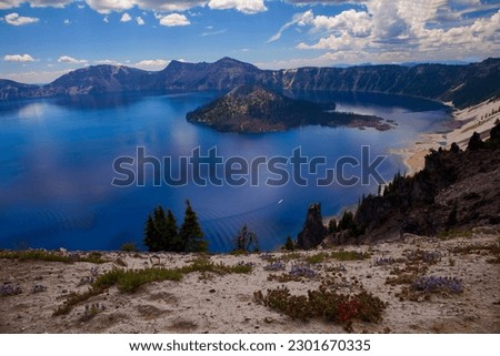 View of Crater Lake and Wizard Island at Crater Lake National Park in Oregon
