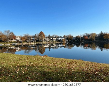 Arlington Heights, Illinois - September 4 2022: Shown here is a view of Lake Terramere during the fall. Royalty-Free Stock Photo #2301682377
