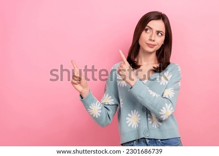 Portrait of charming girl showing news information banner dont trust media suspect lies isolated pink color background