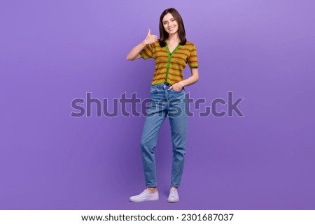 Full length photo of confident cute lady wear striped cardigan showing thumb up isolated purple color background