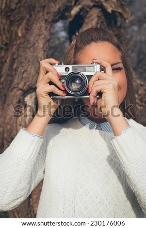 Girl with old camera