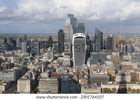 The buildings and skyline of the City of London, the Financial District, with the Walkie Talkie, 20 Fenchurch Street,  visible in the foreground.