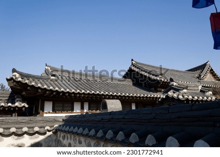 Eaves and fences of beautiful traditional Korean houses. Royalty-Free Stock Photo #2301772941