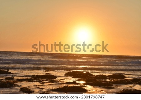 gradual sunset along Pacific Ocean