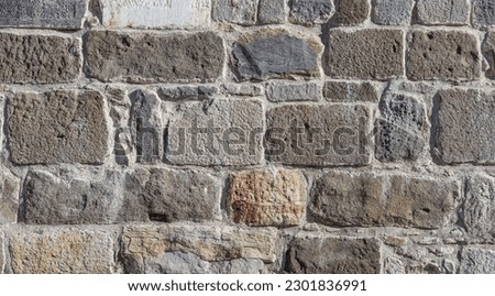 Part of old castle stone wall texture background. High quality photo