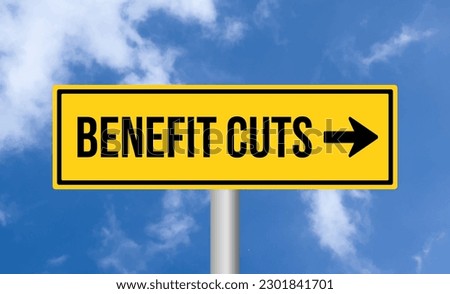 Benefit cuts road sign on sky background