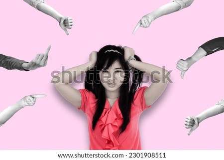 Peer pressure concept - pointing to young asian woman on pink background collage in magazine style. Contemporary art. Modern design Royalty-Free Stock Photo #2301908511